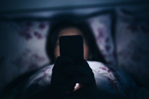 smartphone in bed